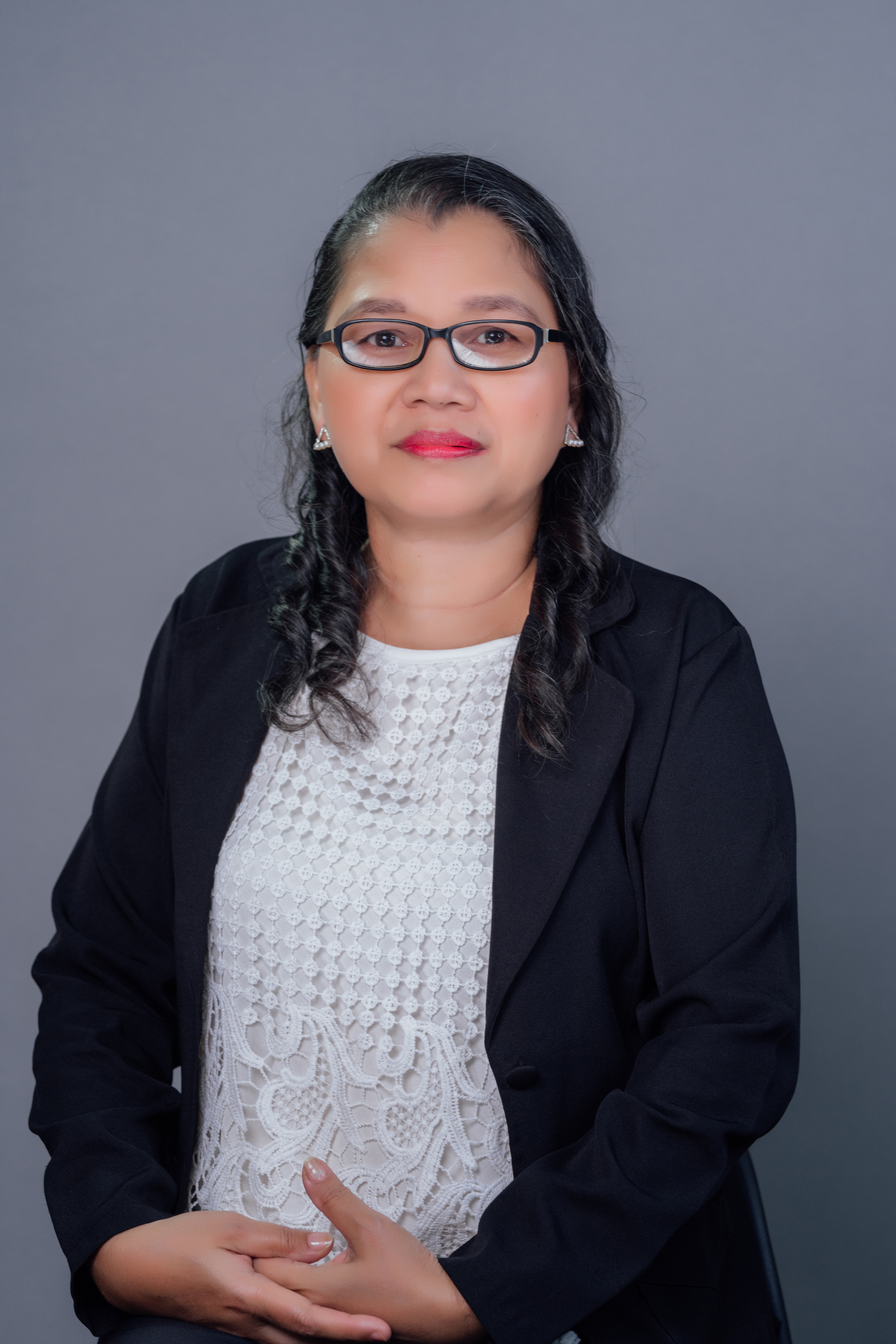 Ms. Carmelyn M. Ole